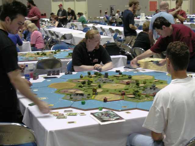 Gamers play a giant version of The Settlers of Catan