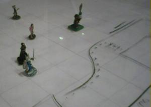 Miniatures on a battle mat