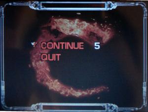 Text that reads 'Continue 5' or 'Quit'