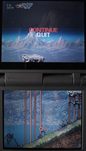 A bullet flies toward the hero from an enemy hidden by the gap between DS screens